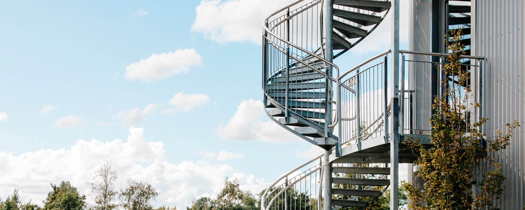 Kindersichere Spindeltreppe mit Bügelgeländer